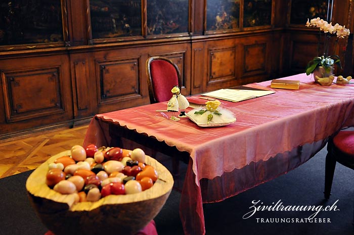 The ceremony table with white ring cushion